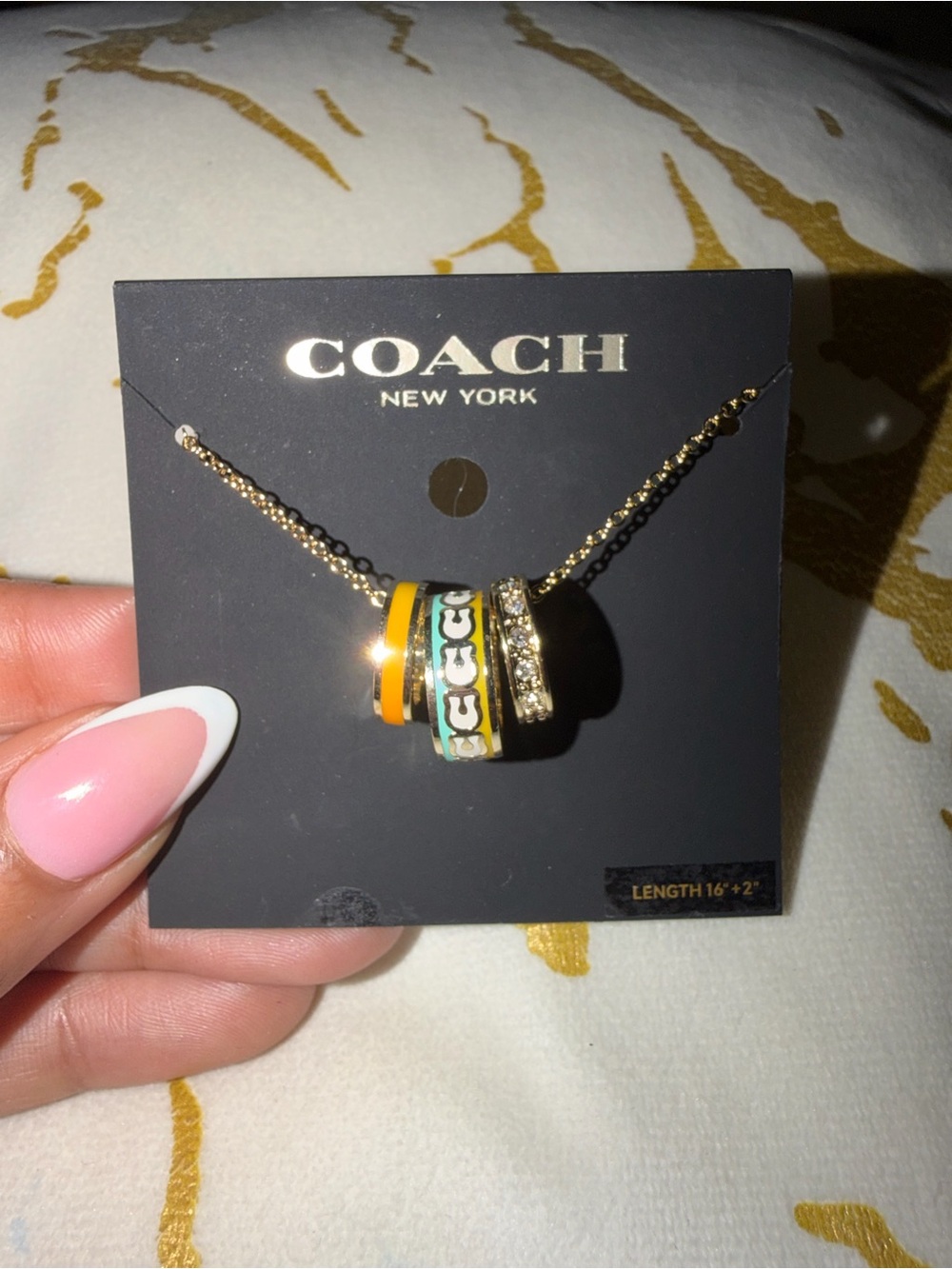 COACH Gold-Tone Necklace with Yellow and Green Enamel Rings